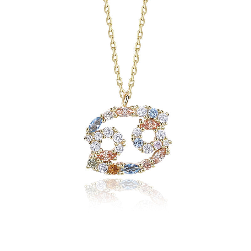 a necklace with a circular design on a chain