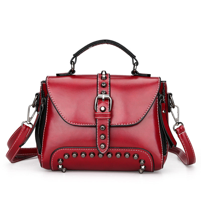 S.B. Retro oil leather rivet hand bags