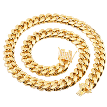 a gold chain with a diamond clasp on a white background