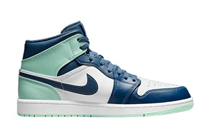 a pair of blue and green sneakers on a white background