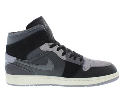 a pair of black and grey sneakers on a white background