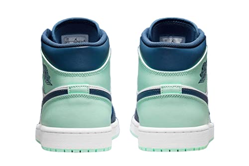 a pair of green and blue sneakers on a white background