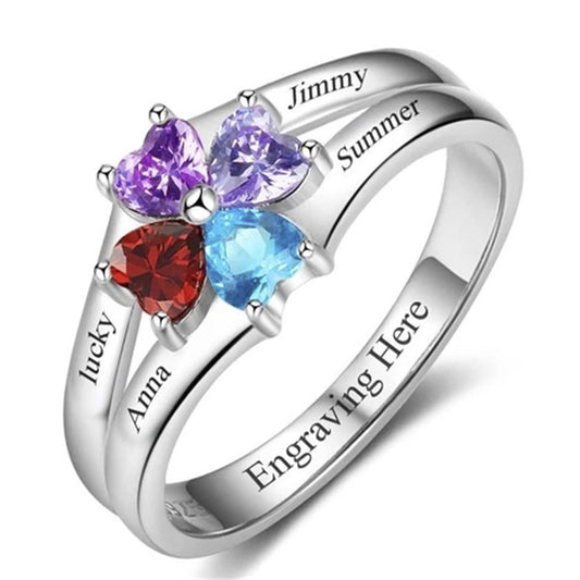 three hearts ring with names engraved on it