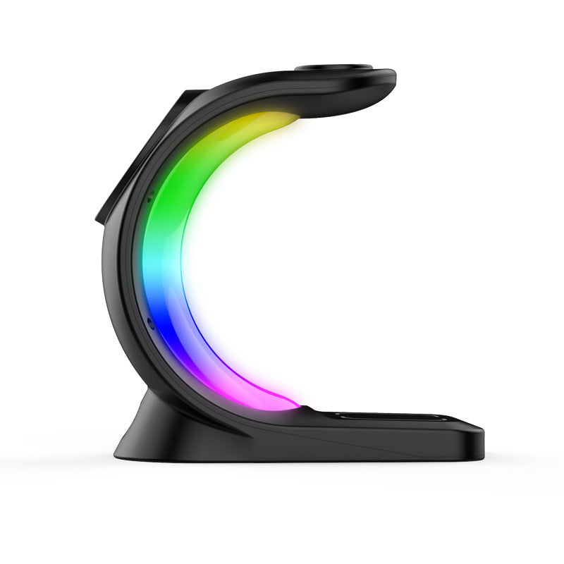 a black device with a rainbow light on it