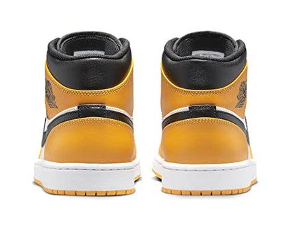 a pair of yellow and black sneakers