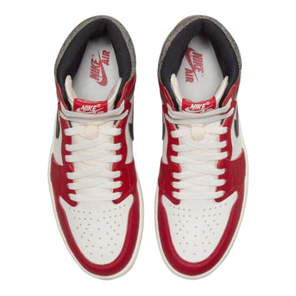 a pair of red and white sneakers on a white background