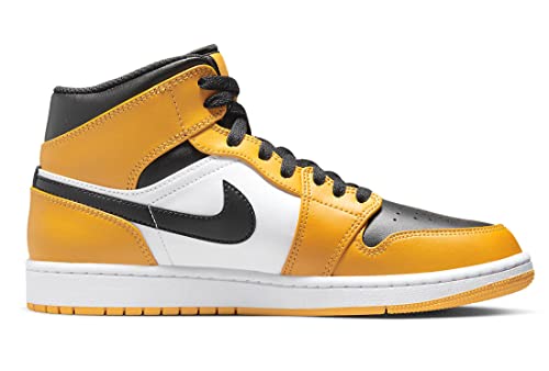 a pair of yellow and black sneakers