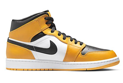 a pair of yellow and black sneakers