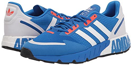 a pair of blue and white adidas sneakers