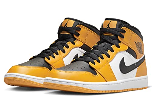 a pair of yellow and black sneakers