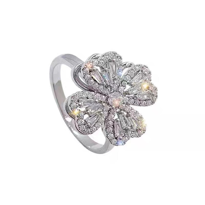 F.J.C. JEWELRY.   Vuitton inspired Rotating Clover Ring