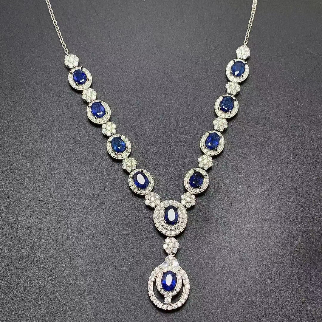 a necklace with blue and white stones on it