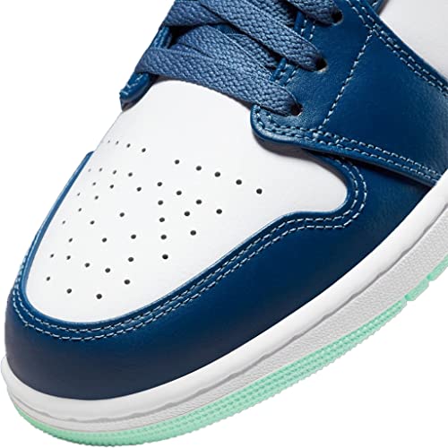 a white and blue shoe with a green sole