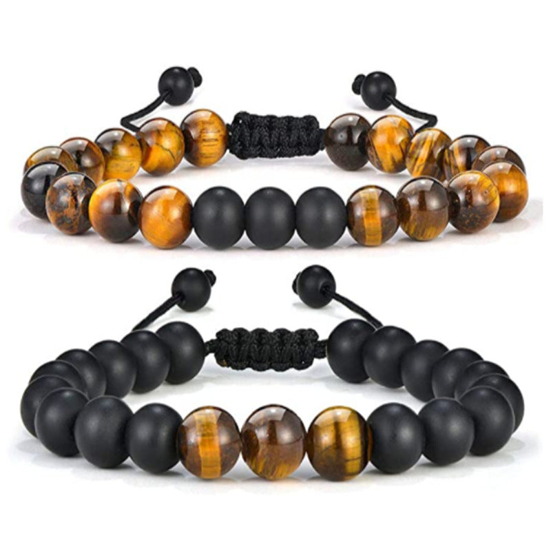 a couple of bracelets with tiger eye beads