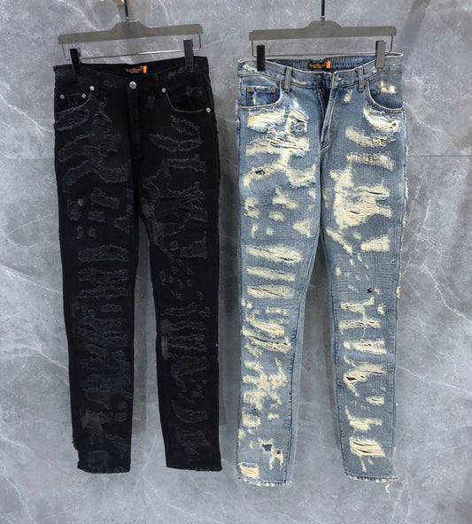 S.M.  Blue and black cow embroidered jeans