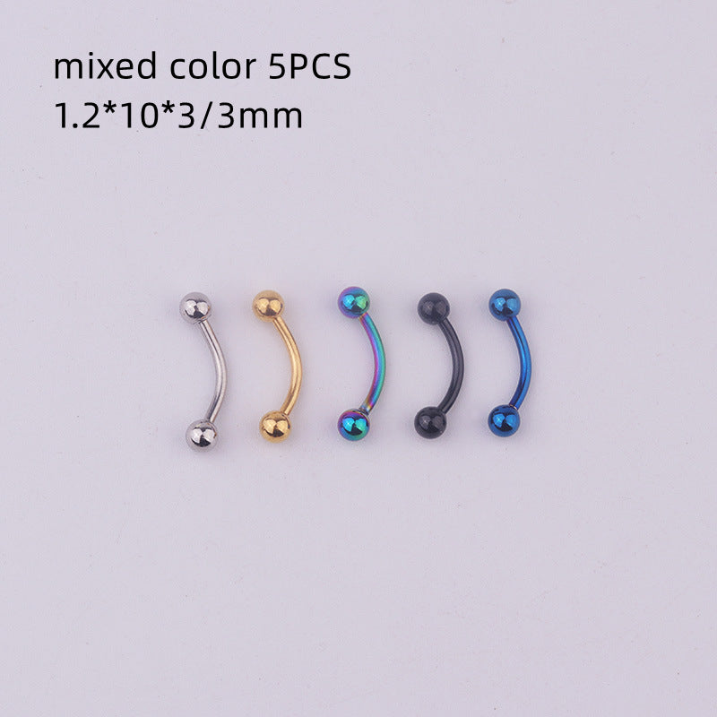 a set of four different colored nose piercings