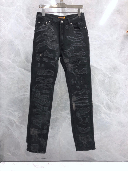 S.M.  Blue and black cow embroidered jeans