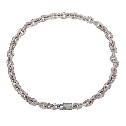 a silver and pink necklace on a white background