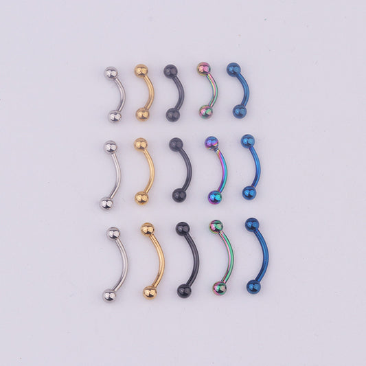 a bunch of different colored metal handles on a white surface