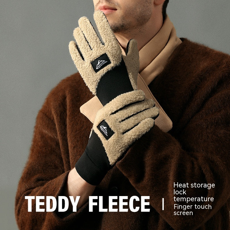 a man in a brown sweater is holding a pair of gloves