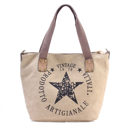 a large canvas bag with a star on it