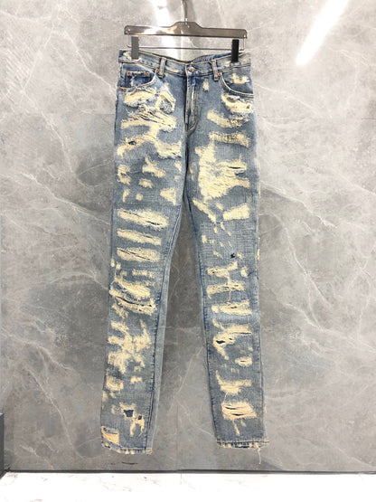 S.M.  Blue and black cow embroidered jeans