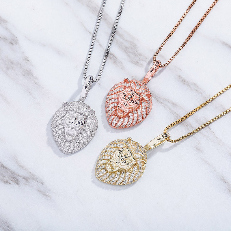 three different necklaces on a marble surface