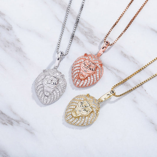 three different necklaces on a marble surface