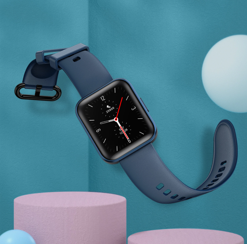 an apple watch hanging from the side of a wall