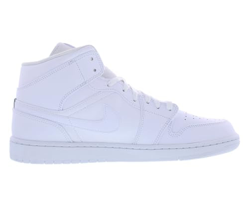 a pair of white sneakers on a white background