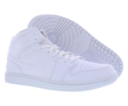 a pair of white sneakers on a white background