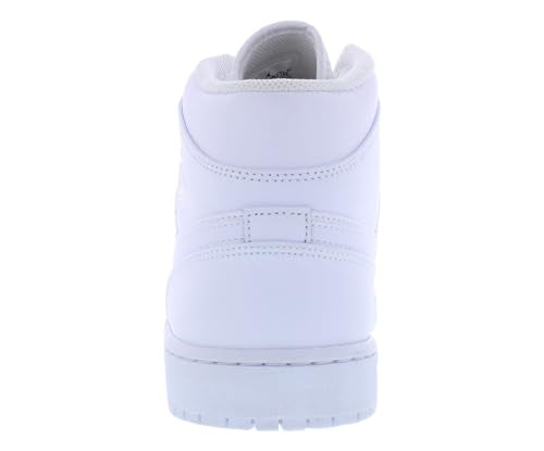 a pair of white shoes on a white background