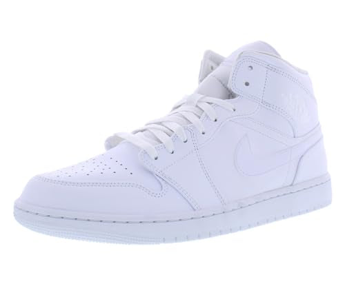 a pair of white sneakers on a white background