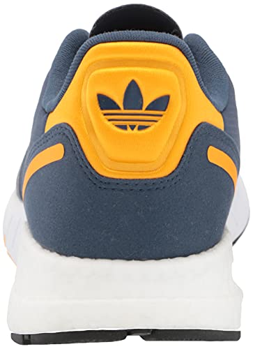 a blue and yellow adidas sneakers