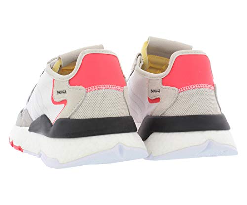 a pair of white and pink sneakers on a white background