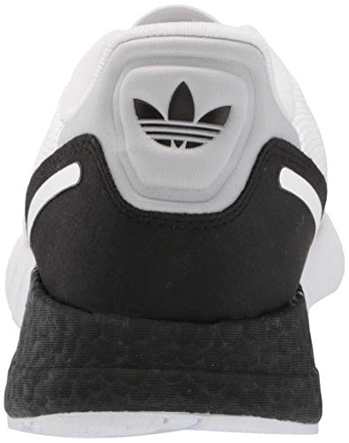 a white and black adidas sneakers