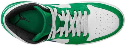 a pair of green and white sneakers