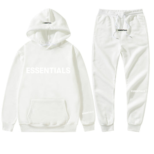 a white hoodie and sweatpants with the words essentials printed on it