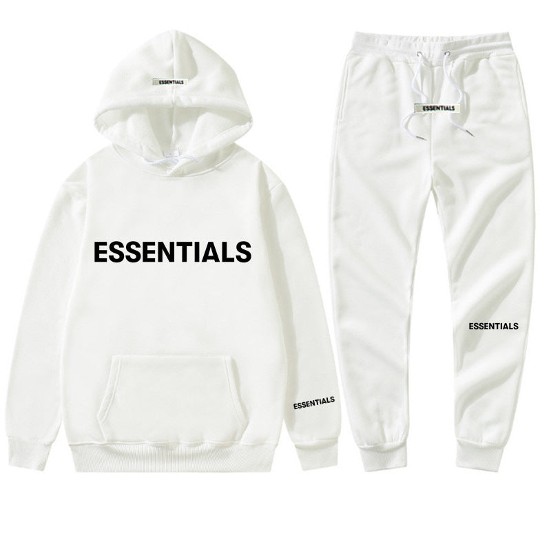 a white hoodie and sweatpants with the words essentials printed on it